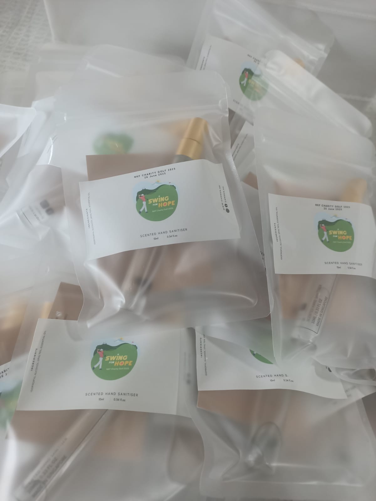 Customised bottles with bag packaging for NKF Charity Golf 2025,  Swing for Hope